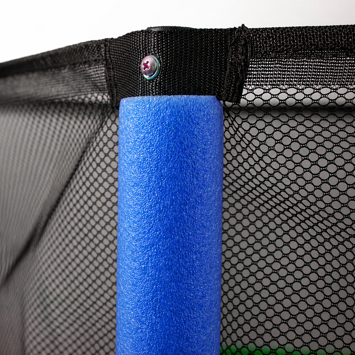 Close-up of a kids' mini trampoline safety net enclosure attached to a steel rod covered with blue foam padding.