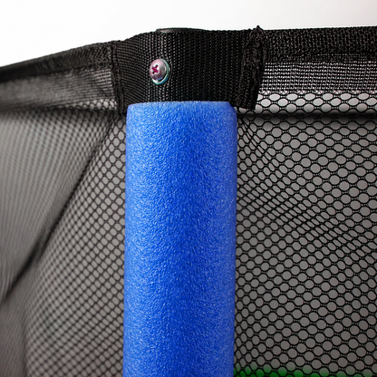 Close-up of a kids' mini trampoline safety net enclosure attached to a steel rod covered with blue foam padding.