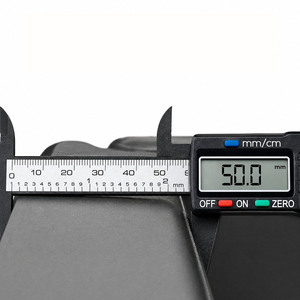 Black tri-folding exercise mat for Pilates and gym workouts, featuring a durable wipe-clean PVC leather cover and integrated carry handles.