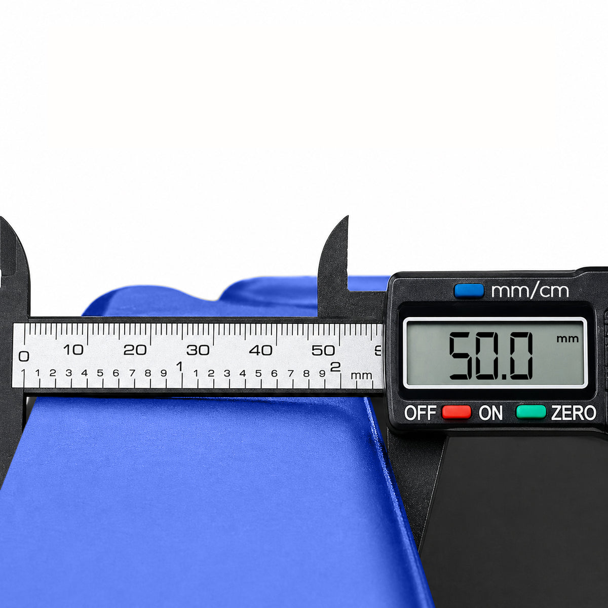 Blue tri-fold core workout mat showing the portable lightweight design with built-in handles for easy storage and joint-protecting cushioning.